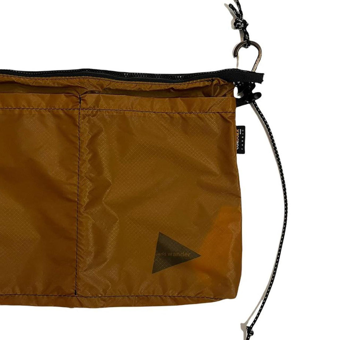 And Wander Reflective Rust Side Bag